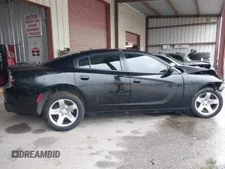 2021 Dodge Charger Police with VIN 2C3CDXAT5MH663136, listed as a IAAI auction lot 40348927 with 66,501 mi miles and . Bid and sale history available at DreamBid. Image 14.