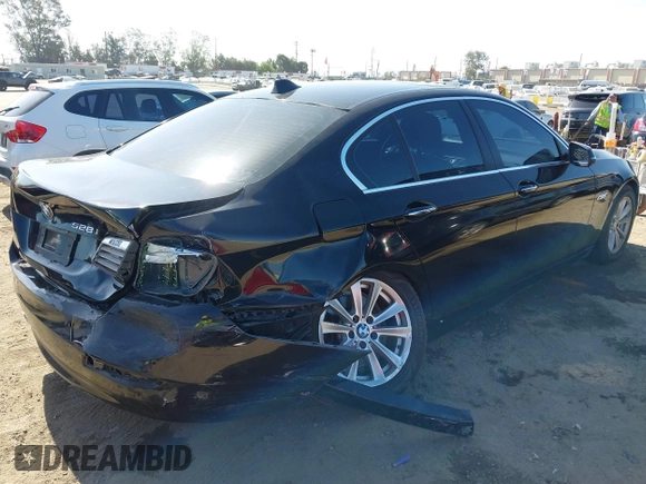 2015 BMW 5 Series 528i z VIN WBA5A5C57FD515826, wystawiony jako IAAI lot #42232062 z przebiegiem 80 641 mil mil oraz . Historia ofert i sprzedaży dostępna na DreamBid. Obrazek 4.