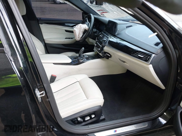 2018 BMW 5 Series M550i xDrive with VIN WBAJB9C51JB035949, listed as a IAAI auction lot 42085727 with Not provided miles and . Bid and sale history available at DreamBid. Image 5.