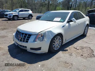 2012 Cadillac CTS z VIN 1G6DA5E51C0151324, wystawiony jako IAAI lot #41811207 z przebiegiem 100 407 mil mil oraz . Historia ofert i sprzedaży dostępna na DreamBid. Obrazek 2.