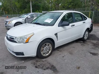 2008 Ford Focus SE with VIN 1FAHP35N98W280147, listed as a IAAI auction lot 41999465 with 133,511 mi miles. Bid and sale history available at carsss.com. Image 2.