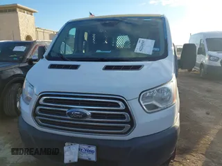 2018 Ford Transit with VIN 1FTYR1ZM6JKA46555, listed as a IAAI auction lot 42216565 with 212,024 mi miles and . Bid and sale history available at DreamBid. Image 12.