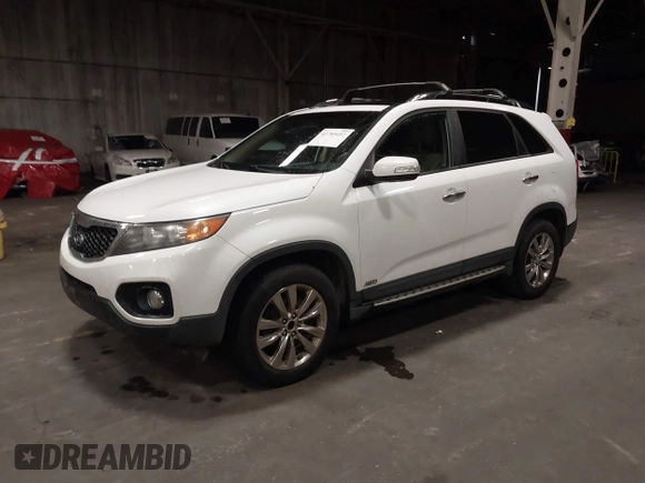 2011 Kia Sorento EX with VIN 5XYKUDA2XBG136475, listed as a IAAI auction lot 41795452 with 218,041 mi miles. Bid and sale history available at carsss.com. Image 2.