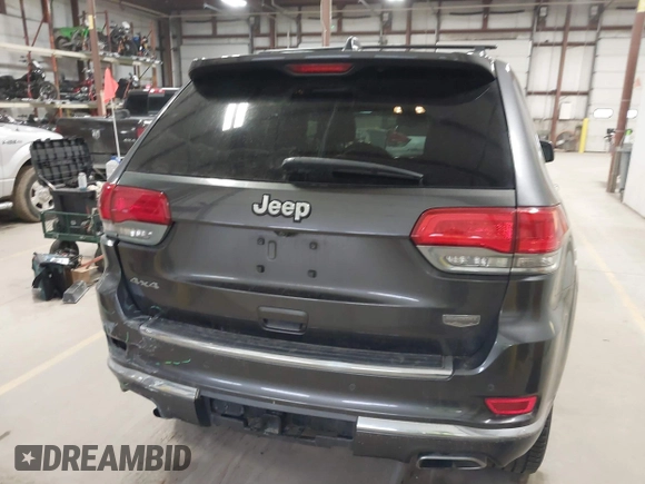 2015 Jeep Grand Cherokee Summit with VIN 1C4RJFJT6FC754799, listed as a IAAI auction lot 41699124 with 124,206 mi miles and . Bid and sale history available at DreamBid. Image 16.