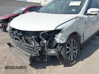 2018 Nissan Rogue SV with VIN 5N1AT2MT2JC702411, listed as a IAAI auction lot 41860534 with 87,997 mi miles and . Bid and sale history available at carsss.com. Image 6.