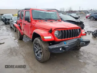 2024 Jeep Wrangler Willys z VIN 1C4RJXN67RW227593, wystawiony jako IAAI lot #41519596 z przebiegiem 7 851 mil mil oraz . Historia ofert i sprzedaży dostępna na DreamBid. Obrazek 1.