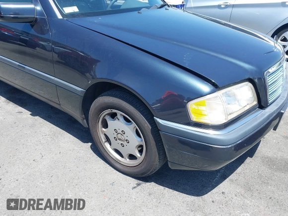 1997 Mercedes-Benz C z VIN WDBHA23EXVA514988, wystawiony jako IAAI lot #42503544 z przebiegiem 142 312 mil mil oraz . Historia ofert i sprzedaży dostępna na DreamBid. Obrazek 6.