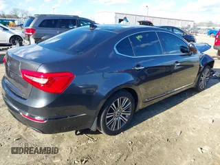 2015 Kia Cadenza Premium with VIN KNALN4D73F5180273, listed as a IAAI auction lot 41222537 with 127,348 mi miles. Bid and sale history available at carsss.com. Image 4.