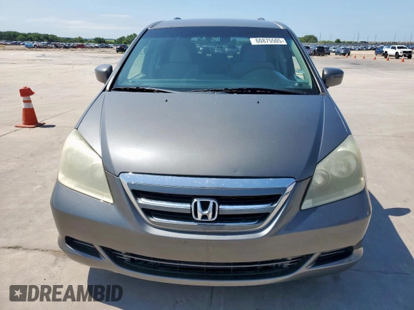 2007 Honda Odyssey EX with VIN 5FNRL38437B068697, listed as a Copart auction lot 60875505 with 211,688 mi miles and Salvage title. Bid and sale history available at DreamBid. Image 5.