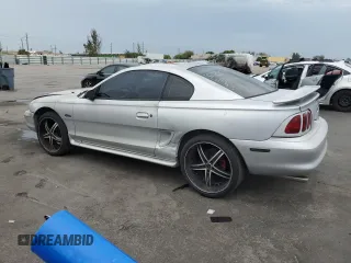 1998 Ford Mustang GT z VIN 1FAFP42XXWF229613, wystawiony jako Copart lot #63231905 z przebiegiem 65 669 mil mil oraz Szkoda całkowita • Salvage title. Historia ofert i sprzedaży dostępna na DreamBid. Obrazek 2.