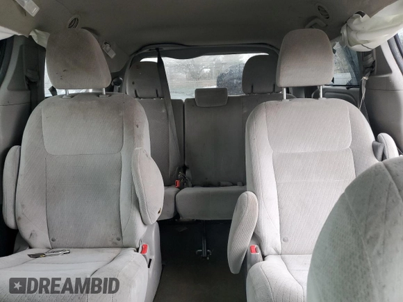 2016 Toyota Sienna LE with VIN 5TDJK3DC7GS128568, listed as a Copart auction lot 84091654 with 0 mi miles and Salvage Title. Bid and sale history available at carsss.com. Image 10.