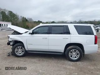 2020 Chevrolet Tahoe LT with VIN 1GNSKBKC2LR253012, listed as a IAAI auction lot 41870002 with 127,789 mi miles and . Bid and sale history available at DreamBid. Image 14.