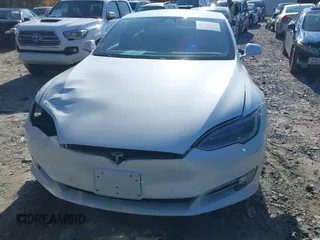 2016 Tesla Model S 70 with VIN 5YJSA1E16GF164264, listed as a IAAI auction lot 40976293 with 68,940 mi miles and . Bid and sale history available at DreamBid. Image 12.
