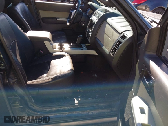 2010 Mercury Mariner Premier with VIN 4M2CN9HG6AKJ17408, listed as a IAAI auction lot 42374385 with 190,488 mi miles and . Bid and sale history available at DreamBid. Image 5.