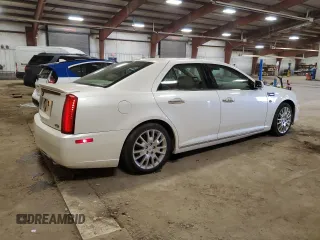 2010 Cadillac STS AWD z VIN 1G6DU6EV0A0106434, wystawiony jako Copart lot #52439915 z przebiegiem 90 187 mil mil oraz Czysty tytuł • Clean title. Historia ofert i sprzedaży dostępna na DreamBid. Obrazek 3.