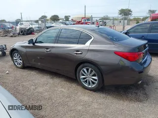 2014 Infiniti Q50 Sport with VIN JN1BV7ARXEM690925, listed as a IAAI auction lot 42163630 with 130,931 mi miles and . Bid and sale history available at carsss.com. Image 3.