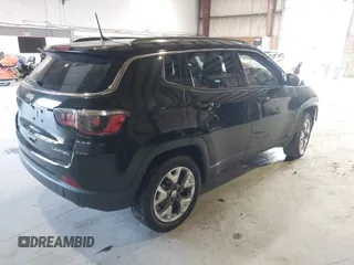 2020 Jeep Compass Limited with VIN 3C4NJDCB5LT235556, listed as a IAAI auction lot 40878726 with 30,590 mi miles and . Bid and sale history available at carsss.com. Image 4.