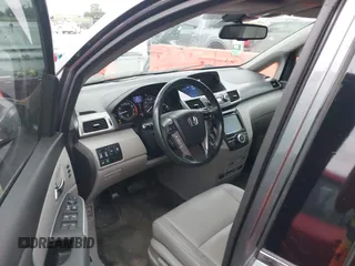 2016 Honda Odyssey Touring Elite with VIN 5FNRL5H96GB063176, listed as a IAAI auction lot 42157604 with 106,177 mi miles. Bid and sale history available at carsss.com. Image 17.