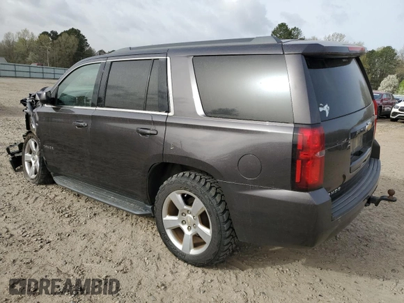 2017 Chevrolet Tahoe LS with VIN 1GNSCAKC5HR277464, listed as a Copart auction lot 49682375 with 131,227 mi miles and Clean title. Bid and sale history available at DreamBid. Image 2.