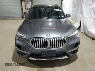 2021 BMW X1 xDrive28i with VIN WBXJG9C06M5S53321, listed as a Copart auction lot 57621945 with 49,668 mi miles and Clean title. Bid and sale history available at DreamBid. Image 5.