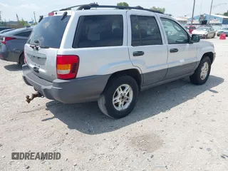 2004 Jeep Grand Cherokee Laredo with VIN 1J4GW48N94C420407, listed as a IAAI auction lot 42689372 with 217,768 mi miles and . Bid and sale history available at DreamBid. Image 4.