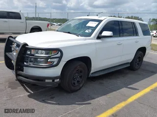 2016 Chevrolet Tahoe Commercial with VIN 1GNLCDEC5GR423300, listed as a IAAI auction lot 41967399 with 147,429 mi miles. Bid and sale history available at carsss.com. Image 20.