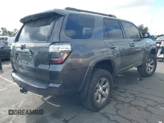 2018 Toyota 4Runner SR5 with VIN JTEBU5JR7J5606564, listed as a IAAI auction lot 41408904 with 149,936 mi miles. Bid and sale history available at carsss.com. Image 4.