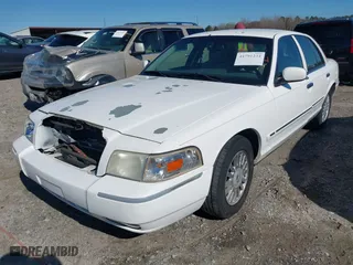 2007 Mercury Grand Marquis LS with VIN 2MEFM75V57X630666, listed as a IAAI auction lot 41791234 with 155,290 mi miles. Bid and sale history available at carsss.com. Image 2.