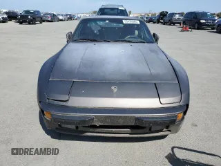 1987 Porsche 944 with VIN WP0AB0944HN472642, listed as a Copart auction lot 55420985 with 122,200 mi miles and Salvage title. Bid and sale history available at DreamBid. Image 5.