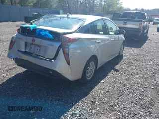 2018 Toyota Prius Two with VIN JTDKARFU5J3057086, listed as a IAAI auction lot 41910758 with 178,279 mi miles and . Bid and sale history available at DreamBid. Image 4.