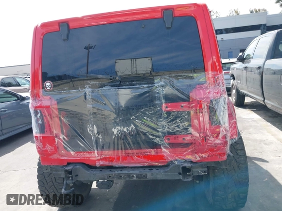 2019 Jeep Wrangler Unlimited Sahara with VIN 1C4HJXEN0KW552028, listed as a IAAI auction lot 41934634 with 53,054 mi miles and . Bid and sale history available at DreamBid. Image 17.
