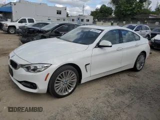 2015 BMW 4 Series 428i xDrive with VIN WBA4C9C53FG135314, listed as a Copart auction lot 82090253 with 93,188 mi miles and . Bid and sale history available at DreamBid. Image 1.