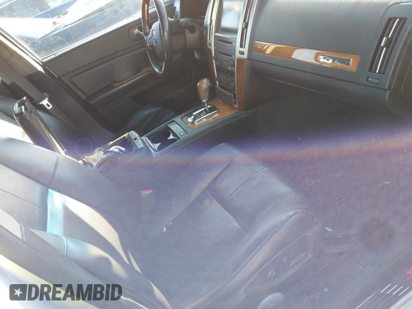 2010 Cadillac STS AWD with VIN 1G6DU6EV8A0120484, listed as a IAAI auction lot 41528974 with 89,489 mi miles and . Bid and sale history available at carsss.com. Image 5.