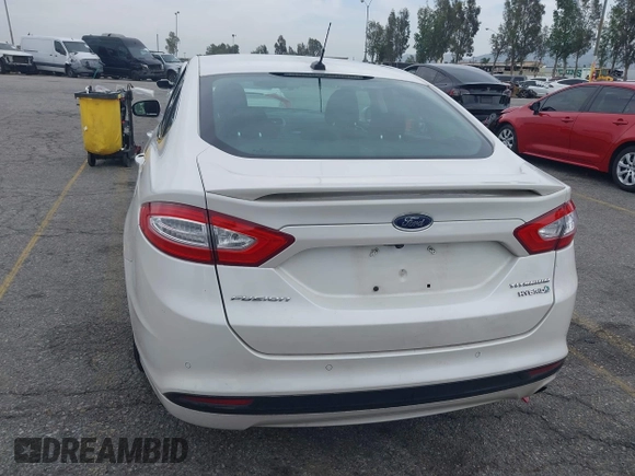 2013 Ford Fusion Titanium Hybrid with VIN 3FA6P0RUXDR386675, listed as a IAAI auction lot 42013986 with 89,349 mi miles. Bid and sale history available at carsss.com. Image 17.