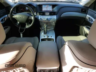 2016 Infiniti Q70 z VIN JN1BY1AP0GM220179, wystawiony jako Copart lot #54129215 z przebiegiem 117 759 mil mil oraz Szkoda całkowita • Salvage title. Historia ofert i sprzedaży dostępna na DreamBid. Obrazek 8.