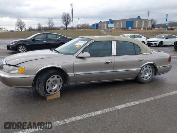 2001 Lincoln Continental with VIN 1LNHM97VX1Y627039, listed as a IAAI auction lot 41482016 with 143,317 mi miles and . Bid and sale history available at DreamBid. Image 14.