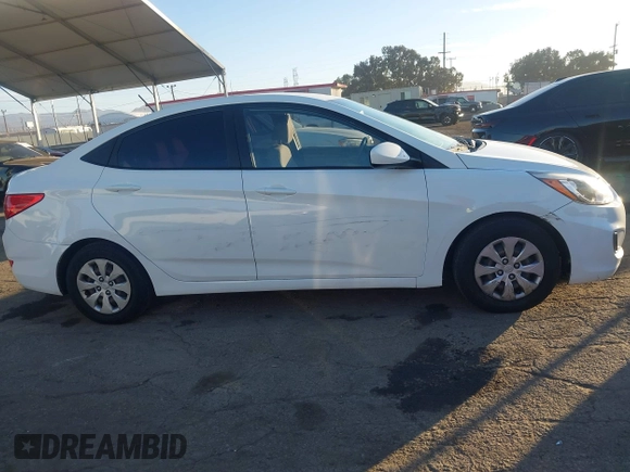 2016 Hyundai Accent SE z VIN KMHCT4AE0GU062891, wystawiony jako IAAI lot #40989721 z przebiegiem 128 457 mil mil oraz . Historia ofert i sprzedaży dostępna na DreamBid. Obrazek 14.