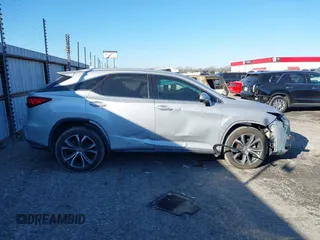 2018 Lexus RX 350 z VIN 2T2ZZMCA6JC096728, wystawiony jako IAAI lot #41356629 z przebiegiem 76 982 mil mil oraz . Historia ofert i sprzedaży dostępna na DreamBid. Obrazek 13.
