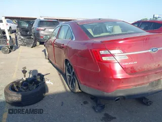 2014 Ford Taurus SEL with VIN 1FAHP2E80EG159131, listed as a IAAI auction lot 42004296 with 140,213 mi miles and . Bid and sale history available at DreamBid. Image 3.