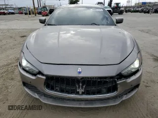 2016 Maserati Ghibli S Q4 z VIN ZAM57RTA6G1172334, wystawiony jako Copart lot #56601575 z przebiegiem 109 524 mil mil oraz Szkody całkowita. Historia ofert i sprzedaży dostępna na DreamBid. Obrazek 5.