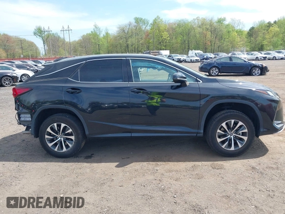 2020 Lexus RX 350 z VIN 2T2HZMDA1LC252476, wystawiony jako IAAI lot #42146480 z przebiegiem 32 610 mil mil oraz . Historia ofert i sprzedaży dostępna na DreamBid. Obrazek 13.