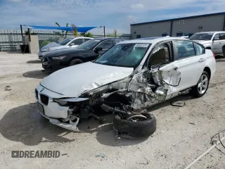 2014 BMW 3 Series 320i xDrive with VIN WBA3C3C52EF987036, listed as a Copart auction lot 40332124 with 0 mi miles and Salvage Title. Bid and sale history available at carsss.com. Image 1.