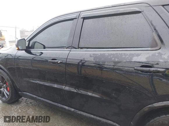 2019 Dodge Durango SRT with VIN 1C4SDJGJXKC550910, listed as a IAAI auction lot 41497932 with 62,541 mi miles and . Bid and sale history available at DreamBid. Image 14.
