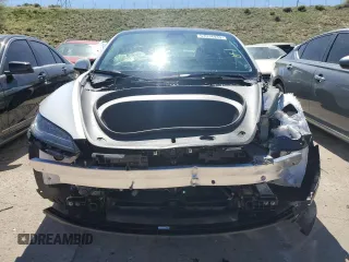 2025 Tesla Model 3 Long Range z VIN 5YJ3E1EA0SF931348, wystawiony jako Copart lot #57074935 z przebiegiem 2 153 mil mil oraz Szkoda całkowita • Salvage title. Historia ofert i sprzedaży dostępna na DreamBid. Obrazek 5.