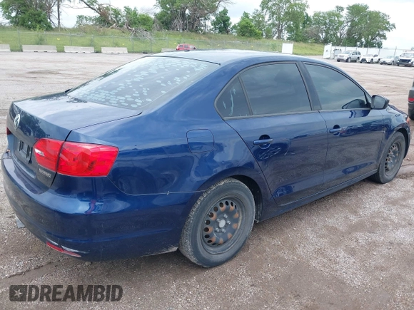 2014 Volkswagen Jetta S with VIN 3VW2K7AJ2EM438149, listed as a IAAI auction lot 42594264 with 54,675 mi miles and . Bid and sale history available at DreamBid. Image 4.