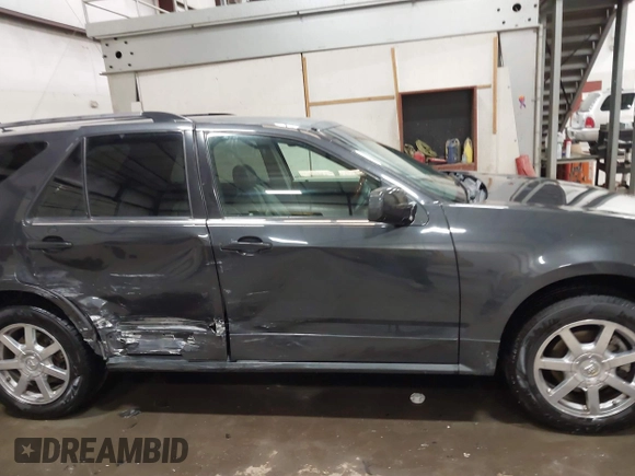 2005 Cadillac SRX with VIN 1GYEE63A550155188, listed as a IAAI auction lot 41442286 with 168,882 mi miles. Bid and sale history available at carsss.com. Image 13.