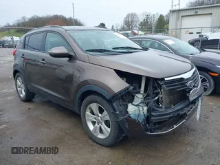 2011 Kia Sportage LX with VIN KNDPB3A20B7024111, listed as a IAAI auction lot 41945892 with 139,605 mi miles and . Bid and sale history available at carsss.com. Image 1.
