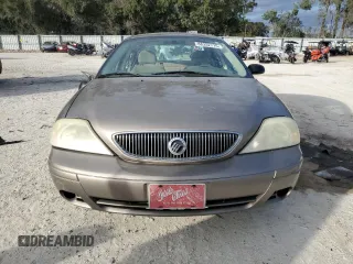 2004 Mercury Sable GS z VIN 1MEFM50U24A617431, wystawiony jako Copart lot #88352715 z przebiegiem 141 457 mil mil oraz Szkody całkowita. Historia ofert i sprzedaży dostępna na DreamBid. Obrazek 5.