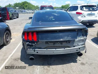 2015 Ford Mustang EcoBoost z VIN 1FA6P8TH5F5351476, wystawiony jako IAAI lot #42157688 z przebiegiem 134 131 mil mil oraz . Historia ofert i sprzedaży dostępna na DreamBid. Obrazek 6.