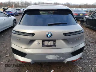 2023 BMW iX xDrive50 with VIN WB523CF03PCL64040, listed as a Copart auction lot 36400593 with 1,399 mi miles. Bid and sale history available at carsss.com. Image 6.